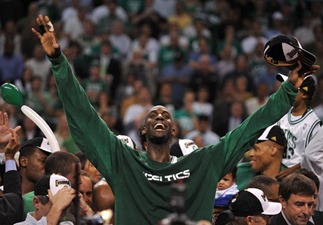 Boston Celtics' Kevin Garnett celebrates after winning after winning Game 6 of the 2008 NBA Finals, in Boston, Massachusetts, June 17, 2008. The Boston Celtics captured the National Basketball Association championship, routing the Los Angeles Lakers 131-92 to win the best-of-seven NBA Finals four games to two. AFP PHOTO / GABRIEL BOUYS (Photo credit should read GABRIEL BOUYS/AFP/Getty Images)
